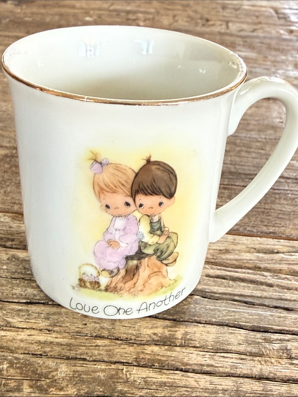 Precious Moments White Mug with Pastel Figurine Illustration and Gold Trim 1978